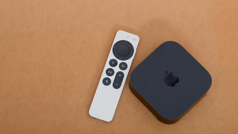 An Apple TV 4K hub and remote.