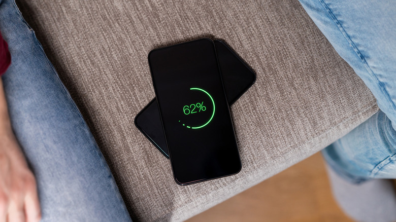 Two phones sharing battery power via wireless charging