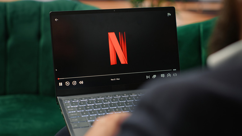 Person watching Netflix on a laptop computer