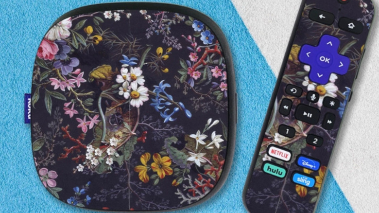 The Roku Ultra streaming device and remote control with custom skins.