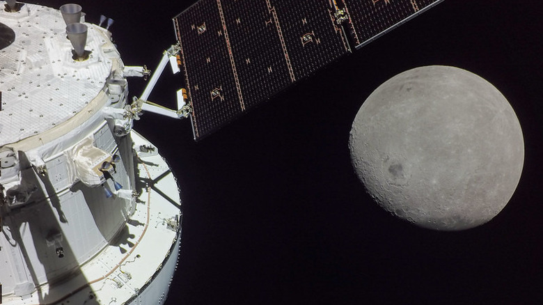 Orion spacecraft takes a selfie while approaching the Moon ahead of the outbound powered flyby - a burn of Orion's main engine that gets us into lunar orbit. During this maneuver Orion came within 81 miles of the lunar surface.