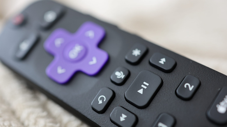 A Roku remote against a white background.
