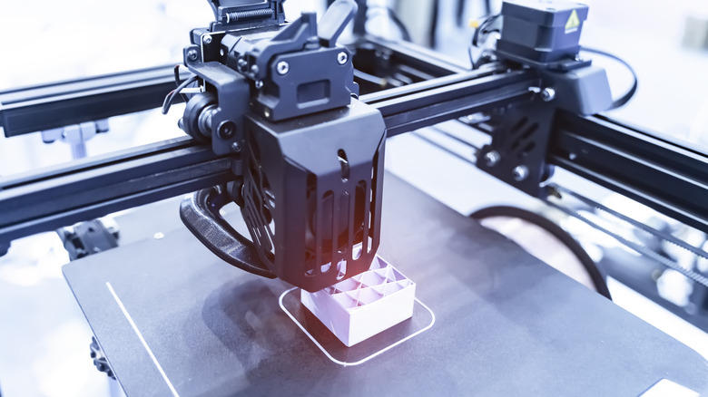 3D printing in use as it prints off a prototype of an undisclosed project