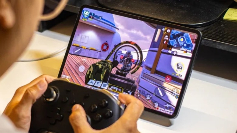 Gamer Playing Astra 2 with controller