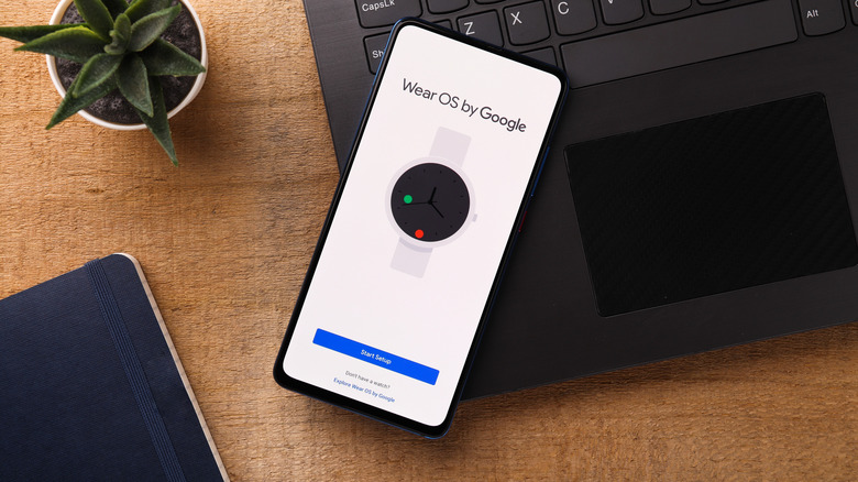 The Google Wear OS logo on an Android phone.