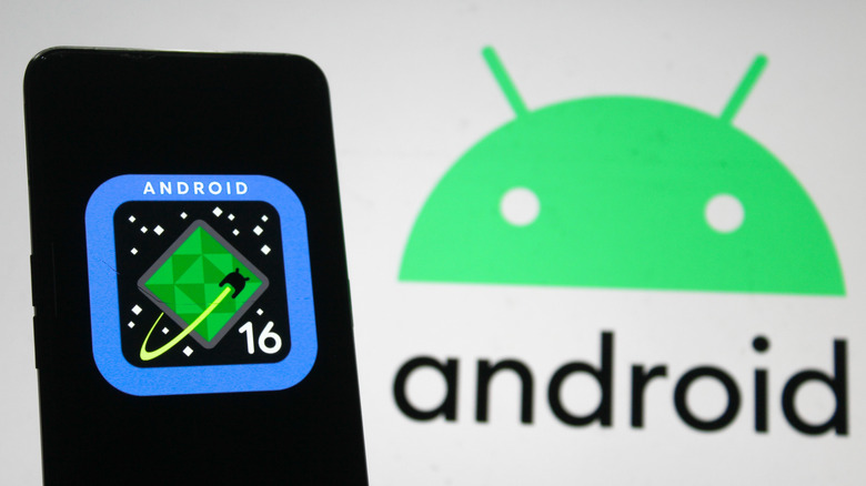 An Android phone with the Android 16 logo on the display