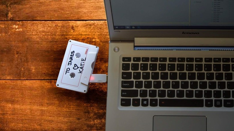 USB Cassette Mixtape plugged into USB drive of laptop.
