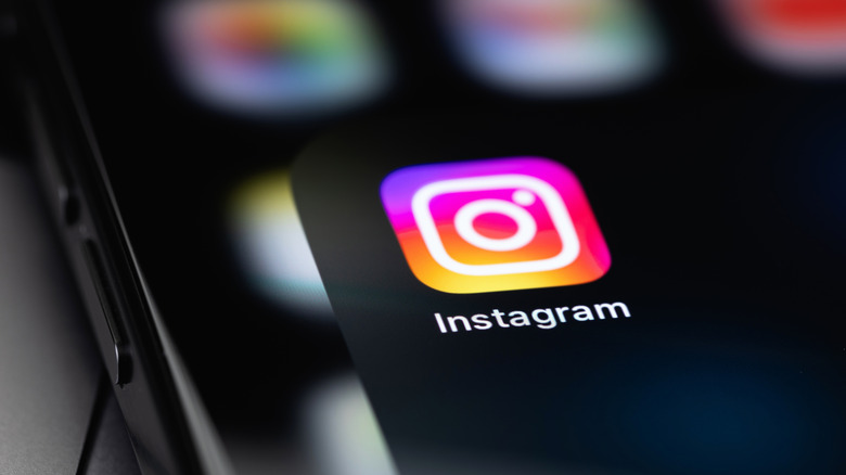 The Instagram app icon on a phone screen