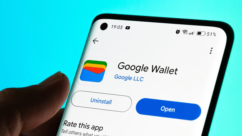 The Google Wallet download page on the Google Play Store on a smartphone.