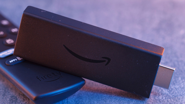 an Amazon Fire TV stick and remote