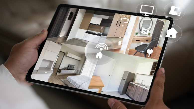 A tablet displaying a home security system camera feed