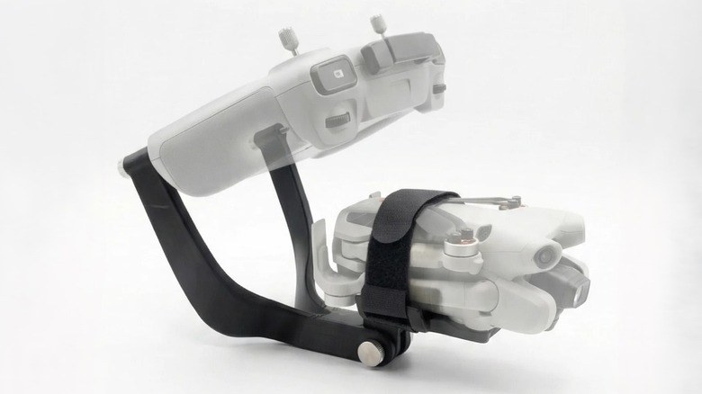 Dronebal DJI Mini 4 Pro handheld mount product image on white.