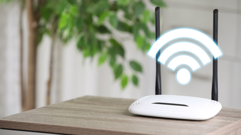 Wireless router on a side table with the Wi-Fi icon displayed above it.