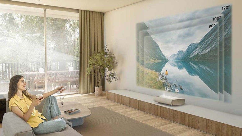 The Samsung LPU7D UST Projector set up in a living room.