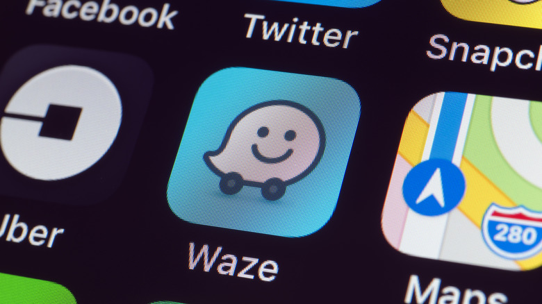 Closeup of screen with Waze, Maps, and other app shortcuts.