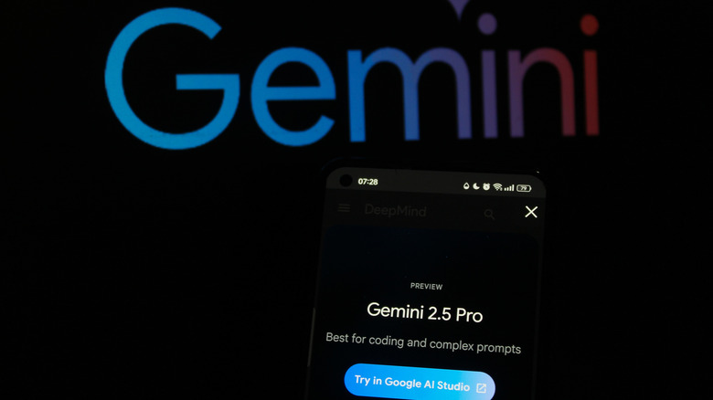 The Gemini logo behind a phone displaying Gemini 2.5 Pro.