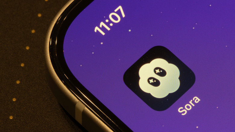 An image of OpenAI's Sora app icon on a phone screen