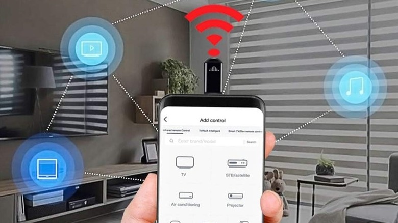 USB-C IR blaster used as remote control with smartphone.