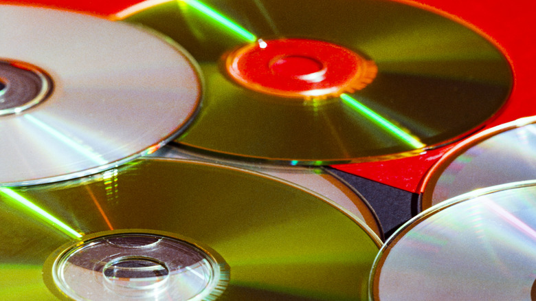 Close up of several CDs laid on top of one another