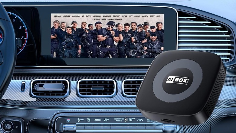 The WhyBox AI Box showing a movie on a car infotainment screen.