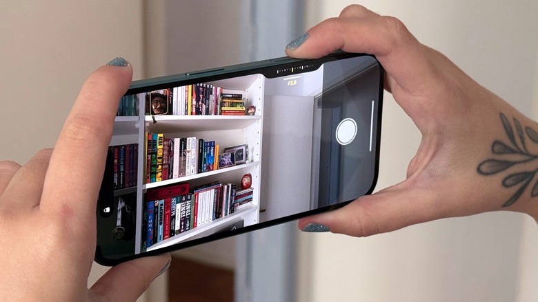 iPhone's Camera Control button in action