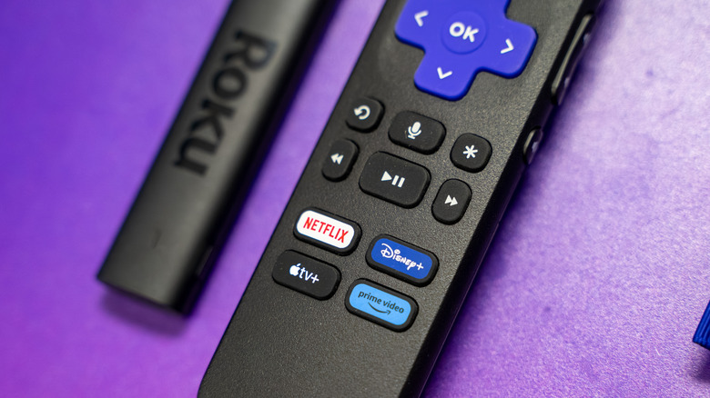 A Roku streaming device and remote control.