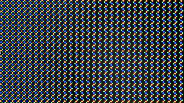 A microscopic look at the iPhone 18 Pro display near the Face ID camera region shows zigzag pixels covering the under-display sensor.