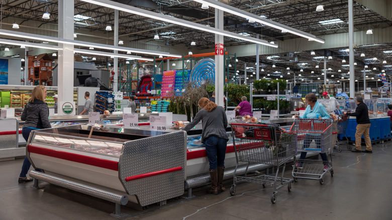 Inside Costco with people shopping