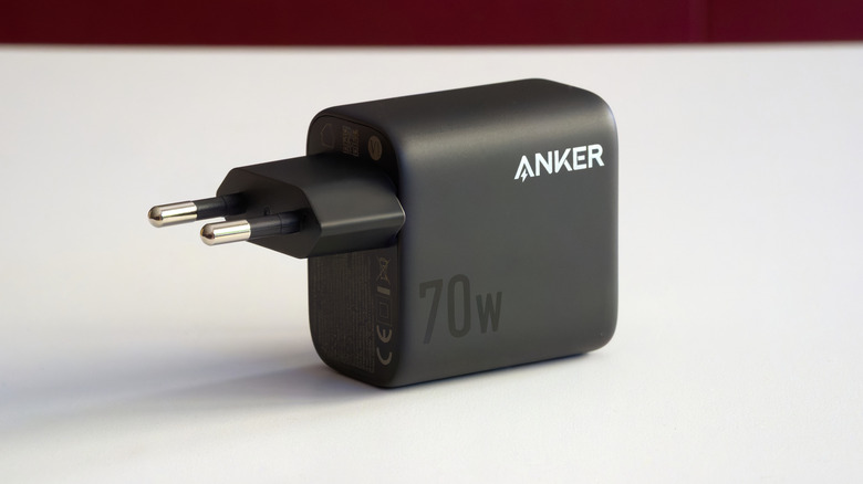 An Anker power adapter that outputs up to 70 watts.