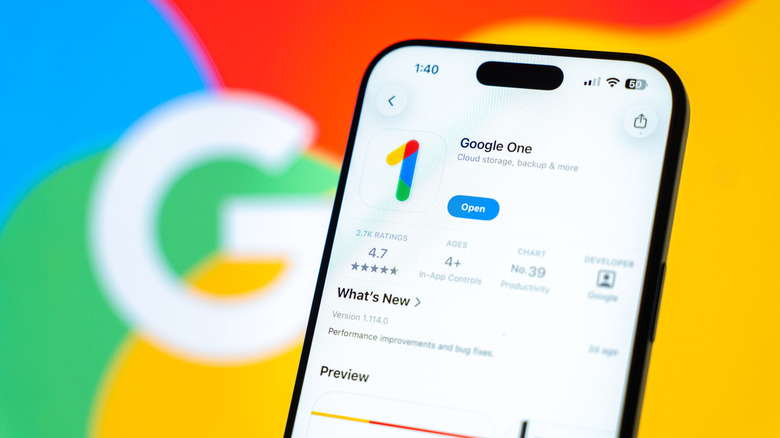 Google One cloud storage and backup app main page with Google logo in background.