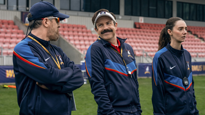 The cast of Ted Lasso season 4 on a football pitch