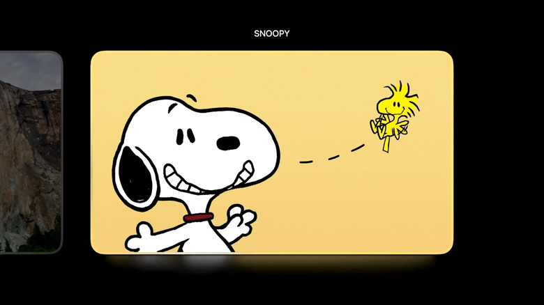 The Snoopy screen saver option is displayed on Apple TV