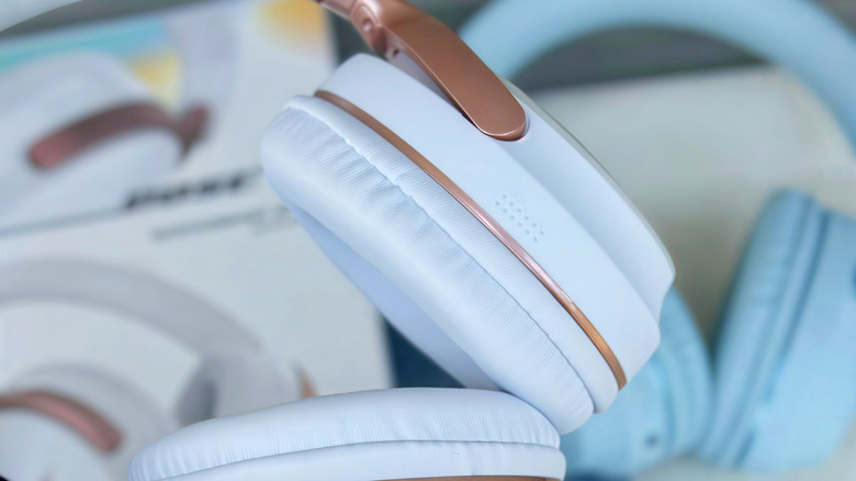 Two pairs of the Bose QuietComfort Ultra Headphones placed next to each other.