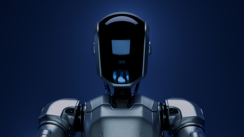 Ominous image of robot with black screen face