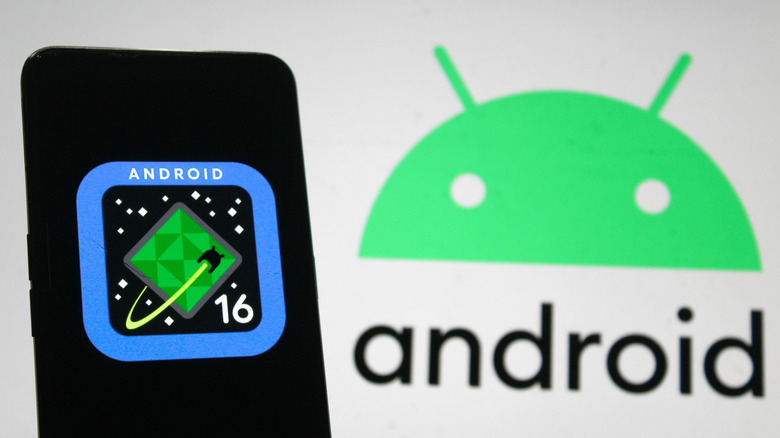 Phone displaying the Android 16 logo with the official Android logo in the background