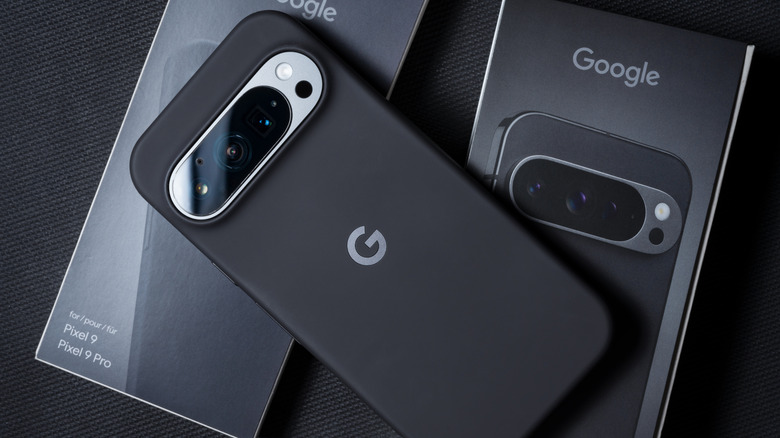 back of google pixel 9 pro in black on top of packaging
