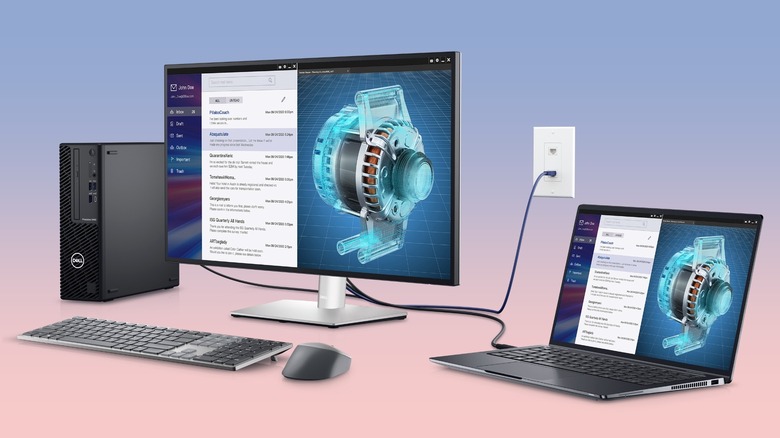 A Dell computer setup showing monitor's KVM switch function in use