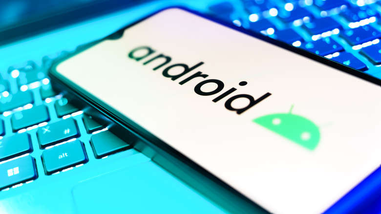 An Android phone with the Android logo on its screen