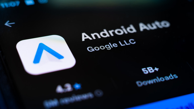 Android Auto app page in the Google Play store on phone screen.