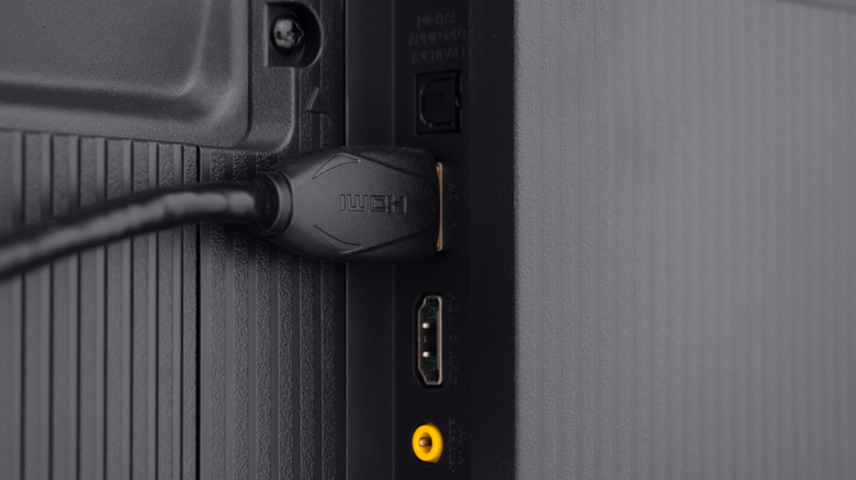 HDMI cable connected to the back of a TV