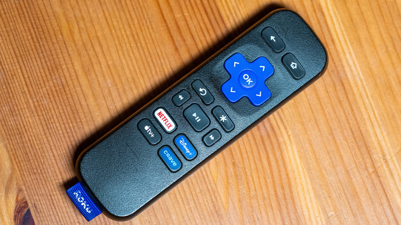 A Roku TV remote on a table