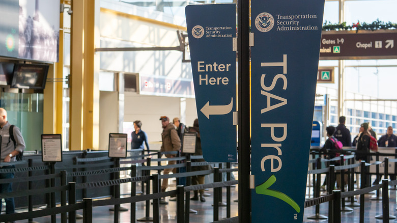 A TSA PreCheck sign at an airport.