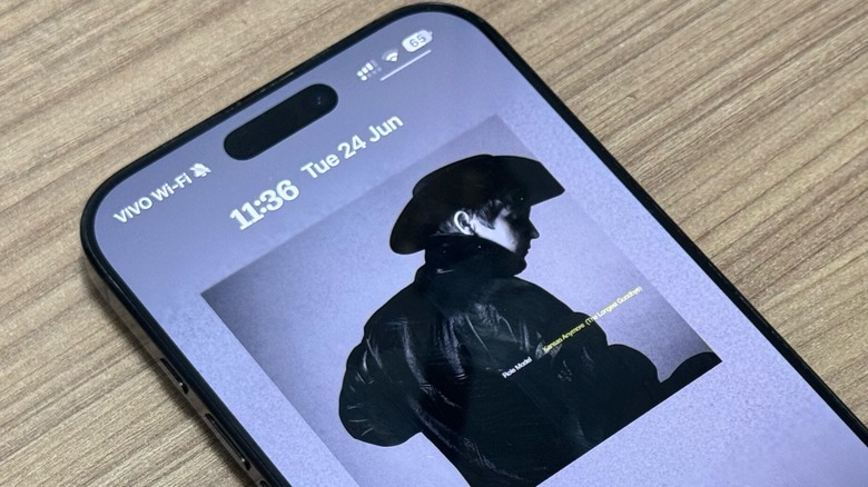 iOS 26 Apple Music on iPhone 16 Pro Max Lock Screen