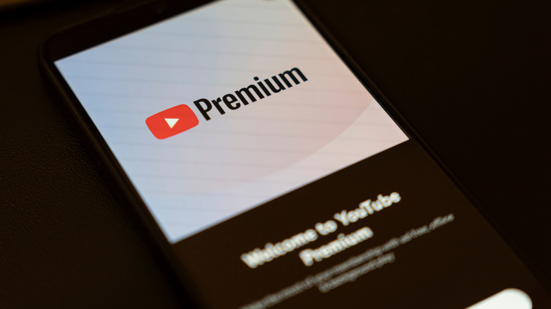 A smartphone displaying a welcome message for YouTube Premium