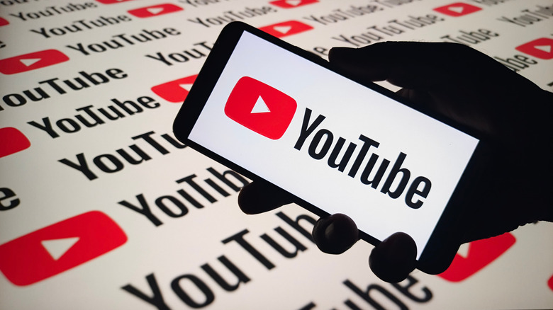 YouTube logo on a smartphone.