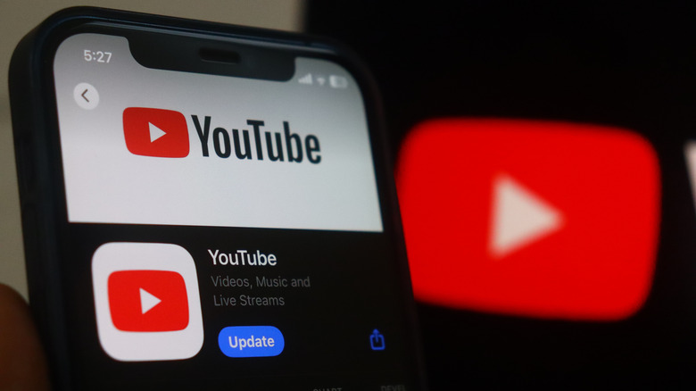 YouTube app on app store with YouTube play button icon in the background
