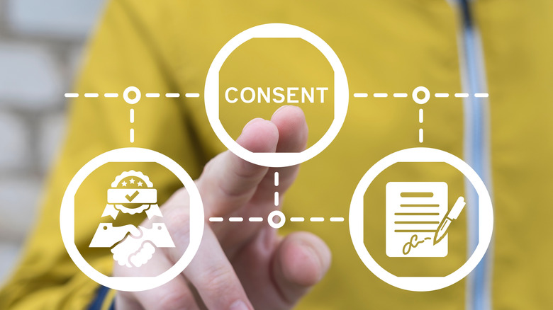 concept of man touching virtual consent option in digital interface