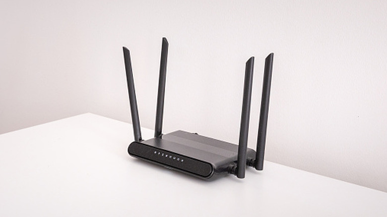black router on a white table