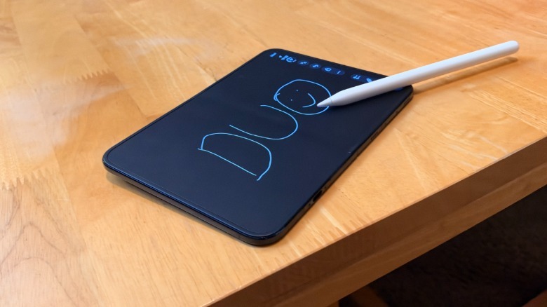 iPhone Duo with Notes app open and drawing from Apple Pencil