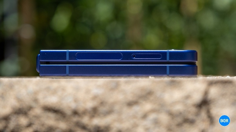 Samsung Galaxy Z Flip 7 folded on a wall.